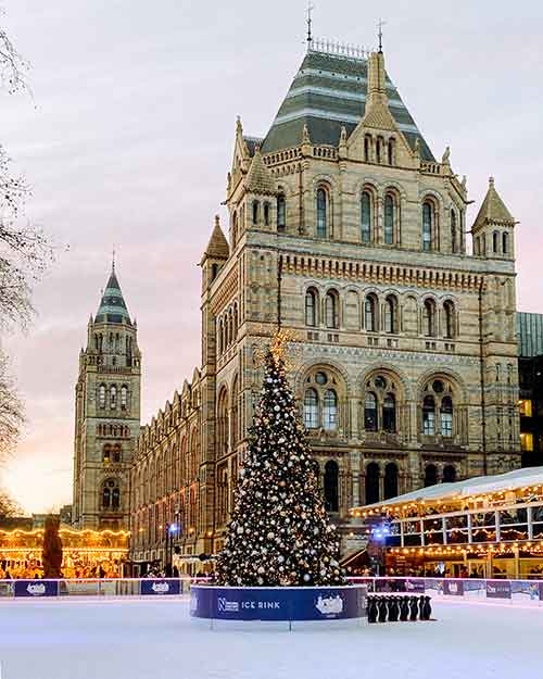 The National History Museum Ice Rink in London UK at Christmas time